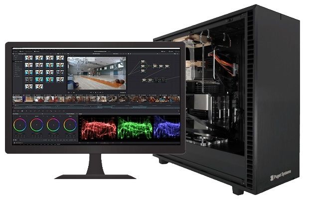 Professional video editing monitor beside an open workstation computer tower